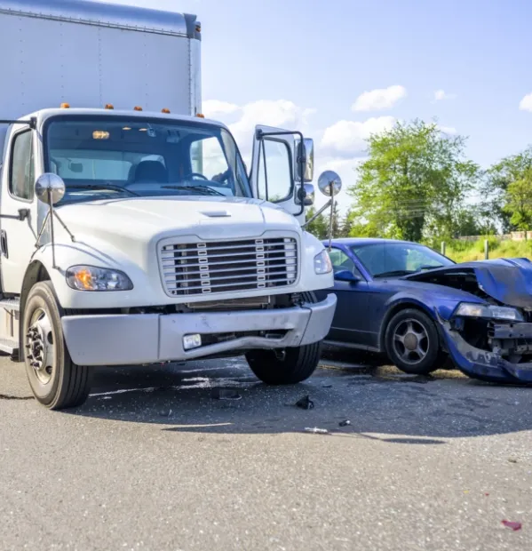 Semi-truck and sedan crash. Our semi truck accident lawyers fight for those injured by commercial vehicles in Bryan and College Station, TX.
