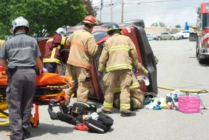 Firefighters at a rollover accident where both drivers had a different version of what happened.